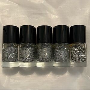 Set of five silver glitter nail polishes